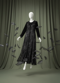 “Luxury black velvet dress for women – elegant soft fabric, long sleeve design.”